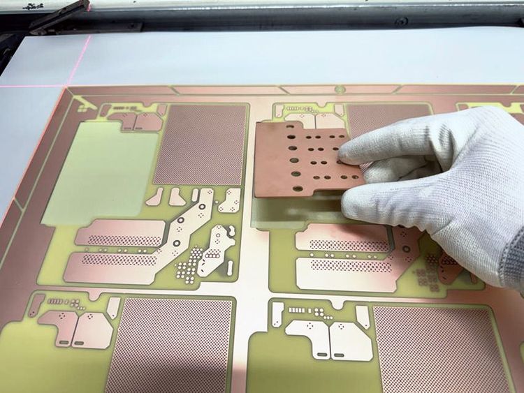 Solid copper plate being inserted into the “pockets”